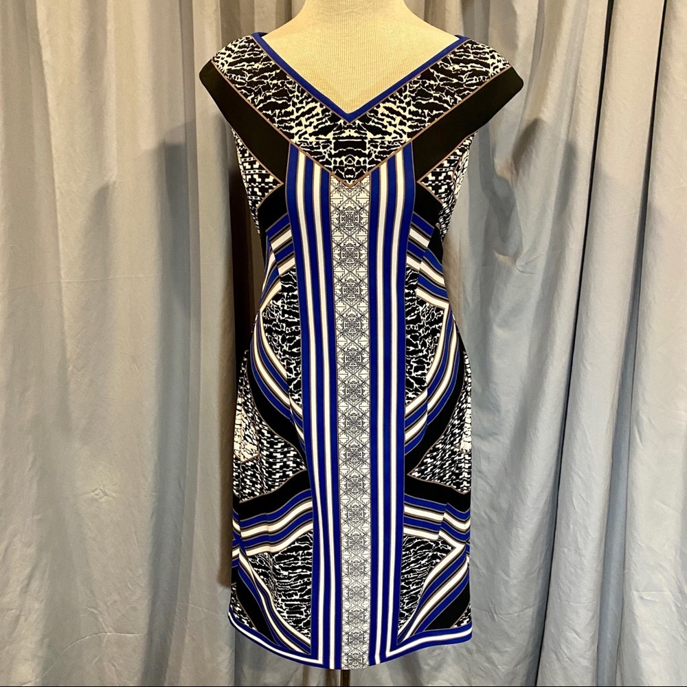 Business style dress.  Perfect with a blazer.  Add a belt to change the style.